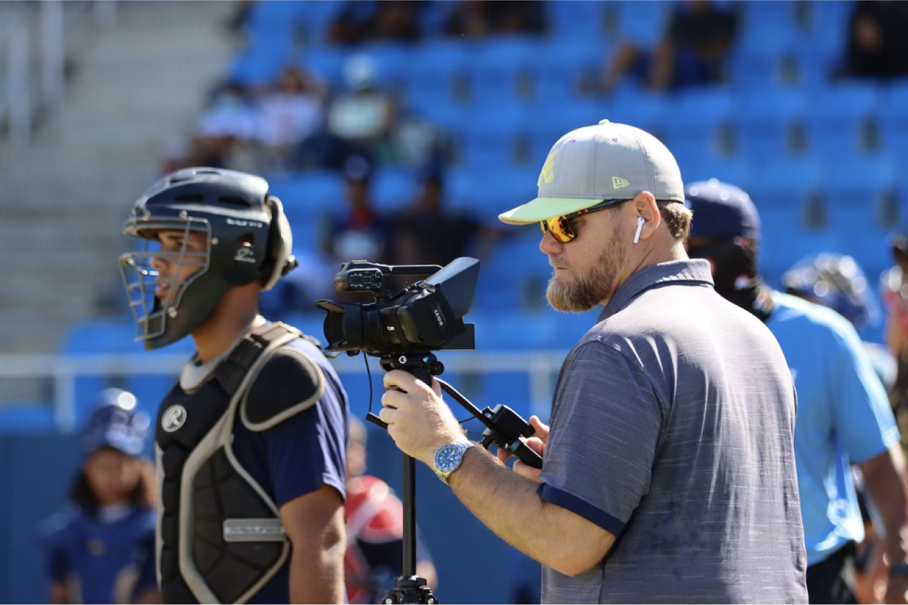Image of scout videoing the game